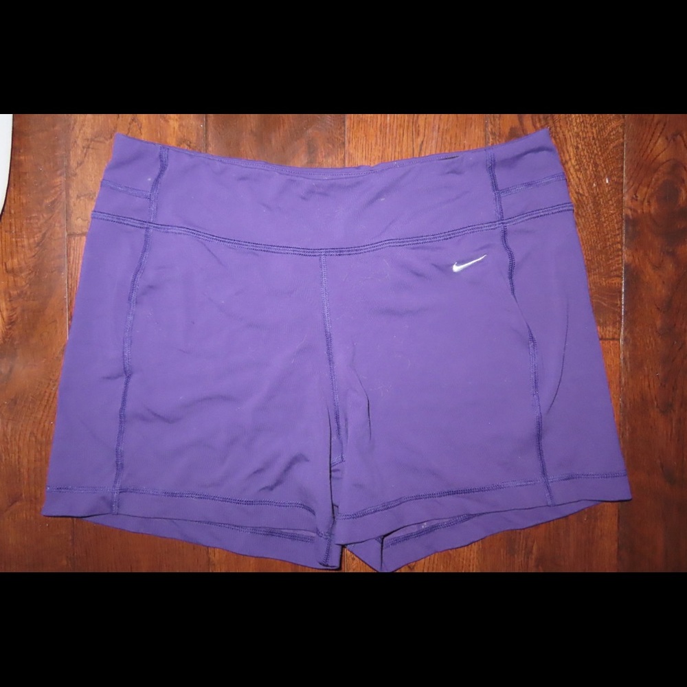 Purple Nike spandex shorts—XL